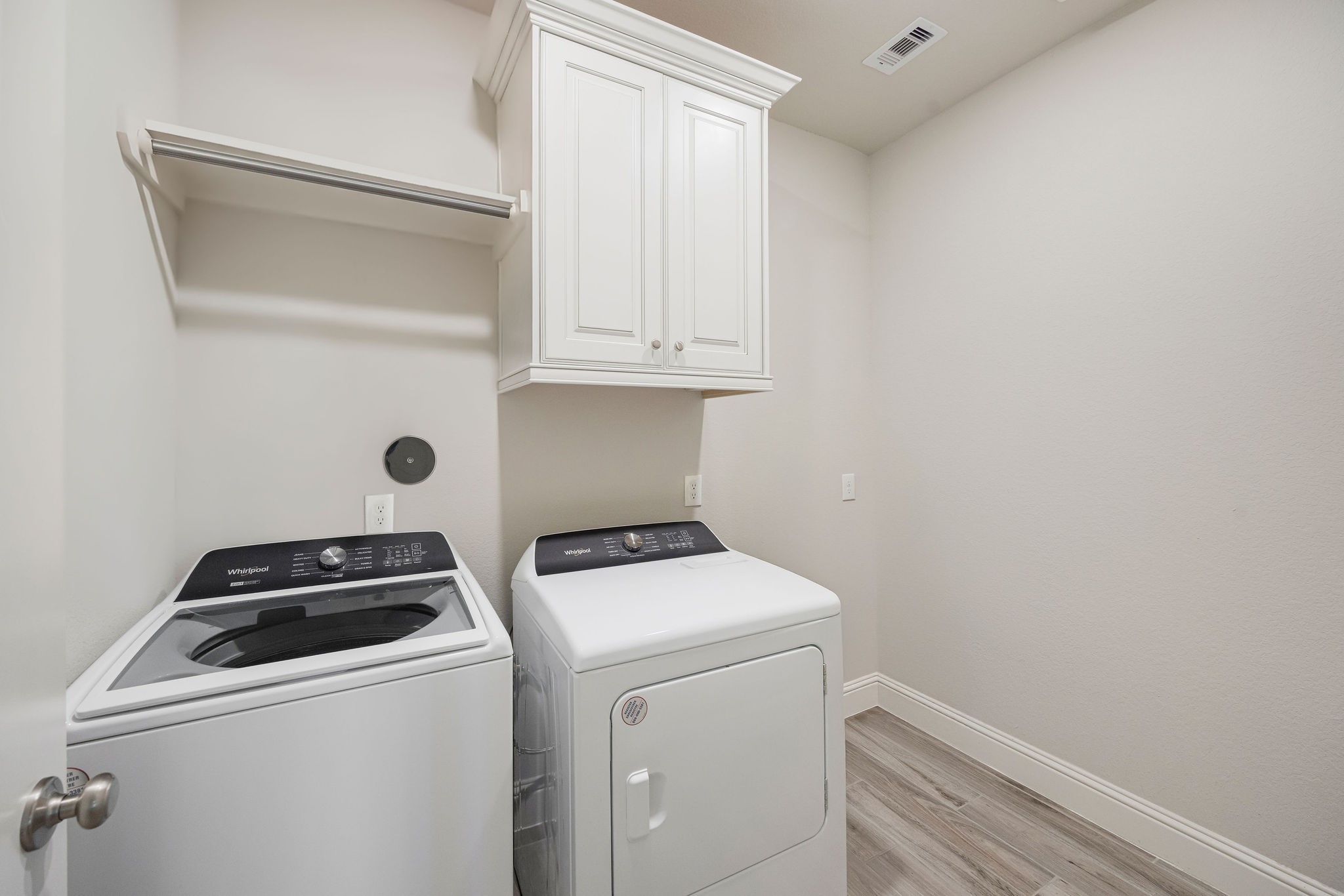 13103 Six Rivers Drive Humble, TX 77346 - Photo 15 of 44 The laundry room connects to the primary suite’s closet for effortless everyday living.