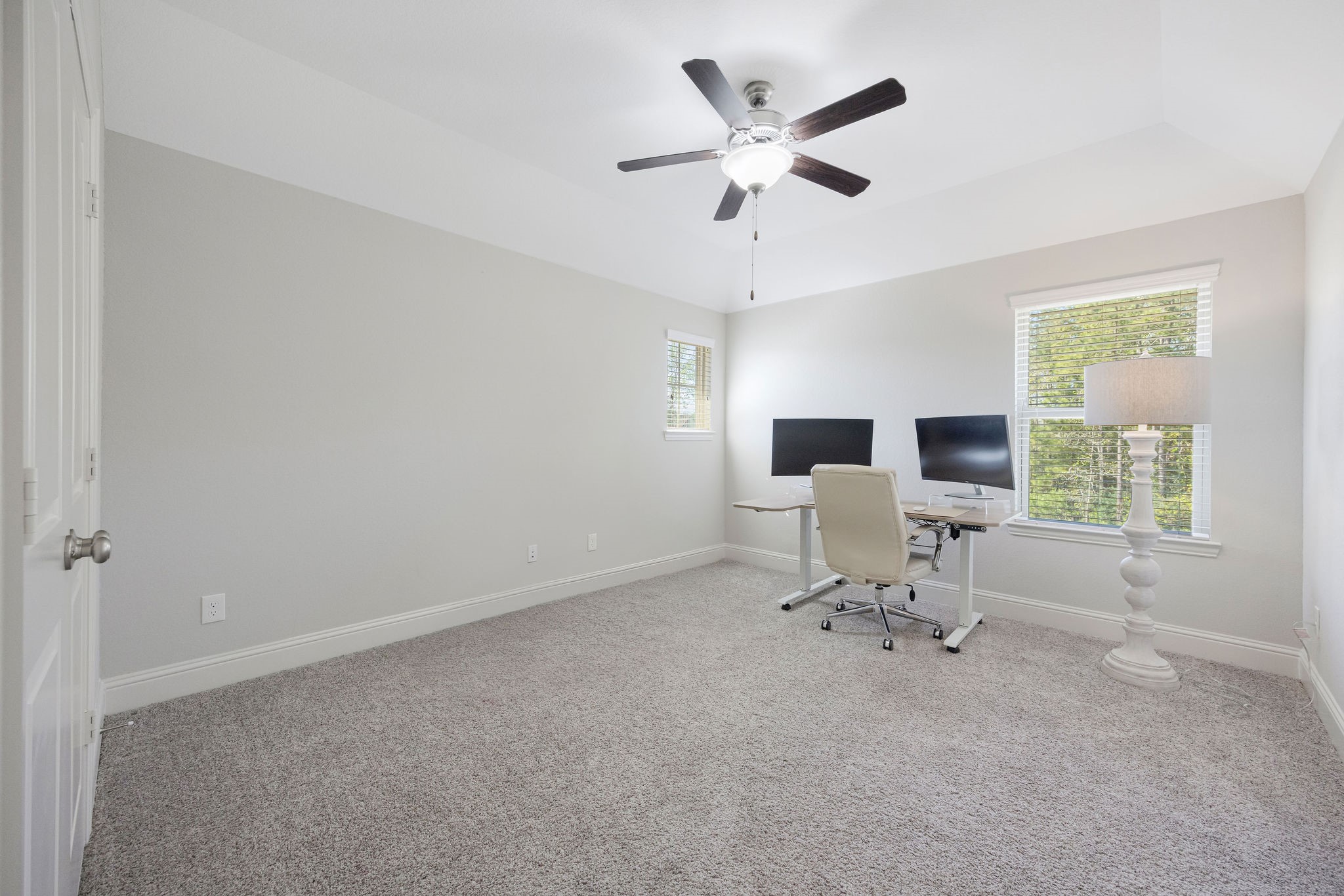 13103 Six Rivers Drive Humble, TX 77346 - Photo 24 of 44 Upstairs you’ll find an additional secondary bedroom with tree views and abundant natural light.