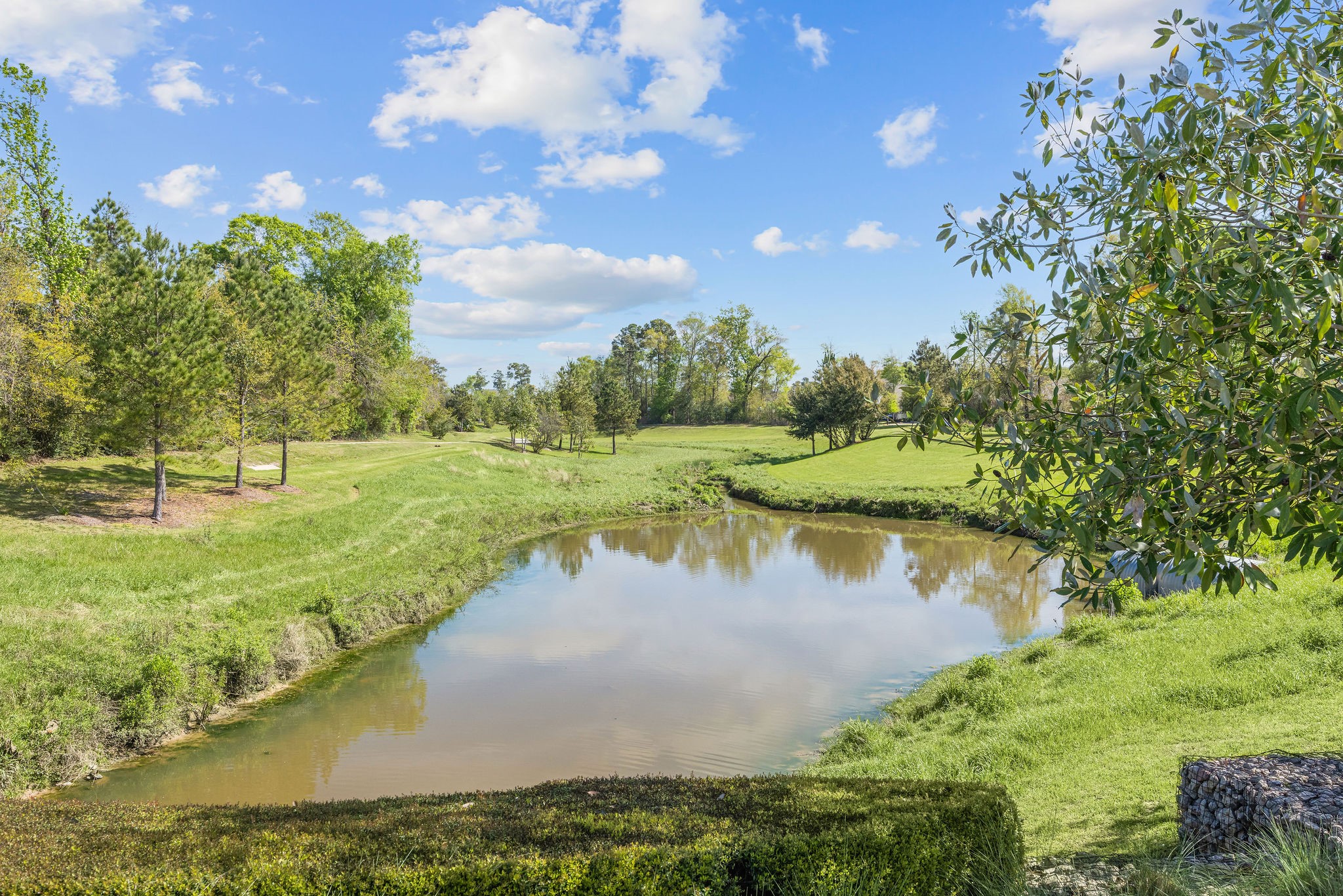 13103 Six Rivers Drive Humble, TX 77346 - Photo 38 of 44 The Groves offers an array of amenities including scenic trails, parks, playgrounds, a resort style pool and splash pad, clubhouse, fitness center, basketball court, soccer field, stocked pond, and picnic areas.