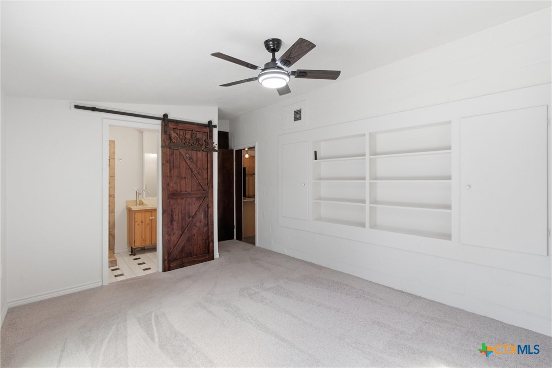 2108 River Road San Marcos, TX 78666 - Photo 24 of 37 Bath w/shower closets inset in wall and behind door