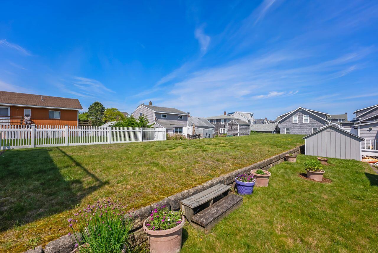 5 Spurr Road Pocasset, MA 02559 - Photo 22 of 42 a view of a house with a big yard