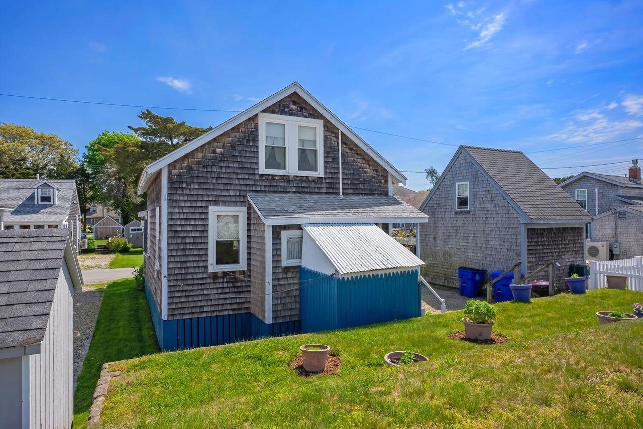 5 Spurr Road Pocasset, MA 02559 - Photo 23 of 42 a front view of house with yard