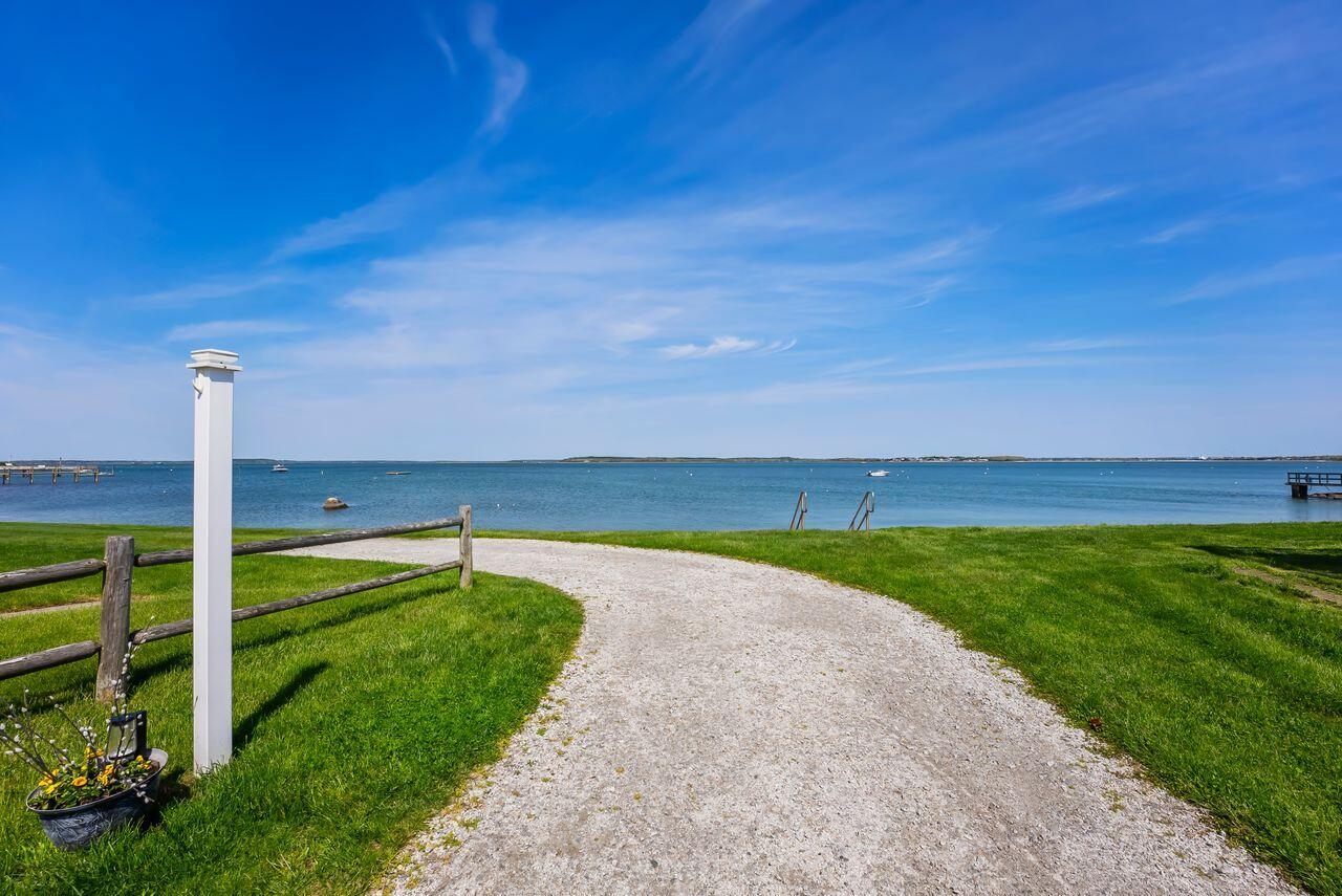 5 Spurr Road Pocasset, MA 02559 - Photo 30 of 42 a view of a ocean with a big yard