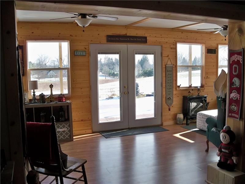 236 Center Church Road Grove City, PA 16127 - Photo 19 of 25 From family room to sunroom. Room for entertainment!
