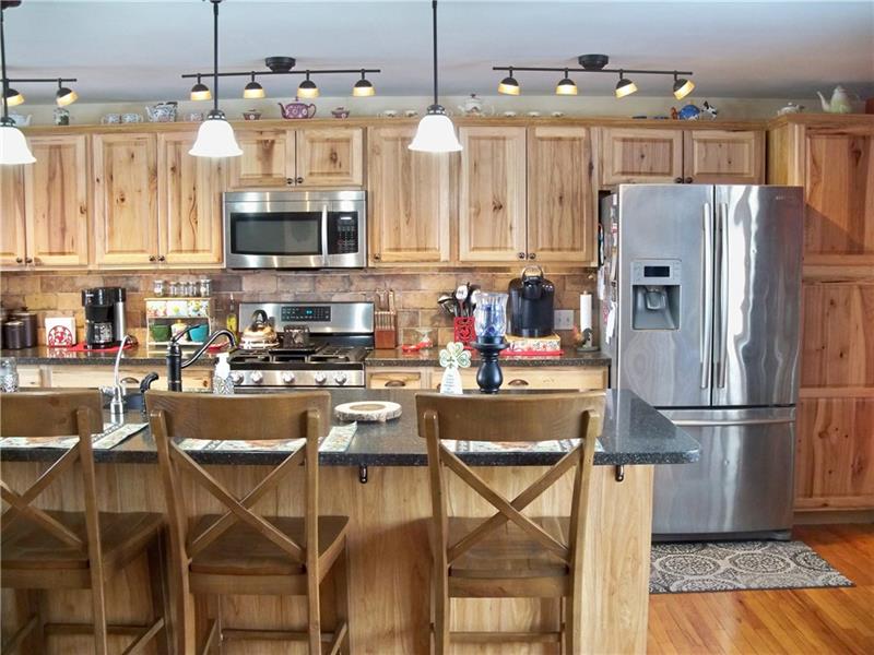 236 Center Church Road Grove City, PA 16127 - Photo 5 of 25 Stainless steel appliances and kitchen island.