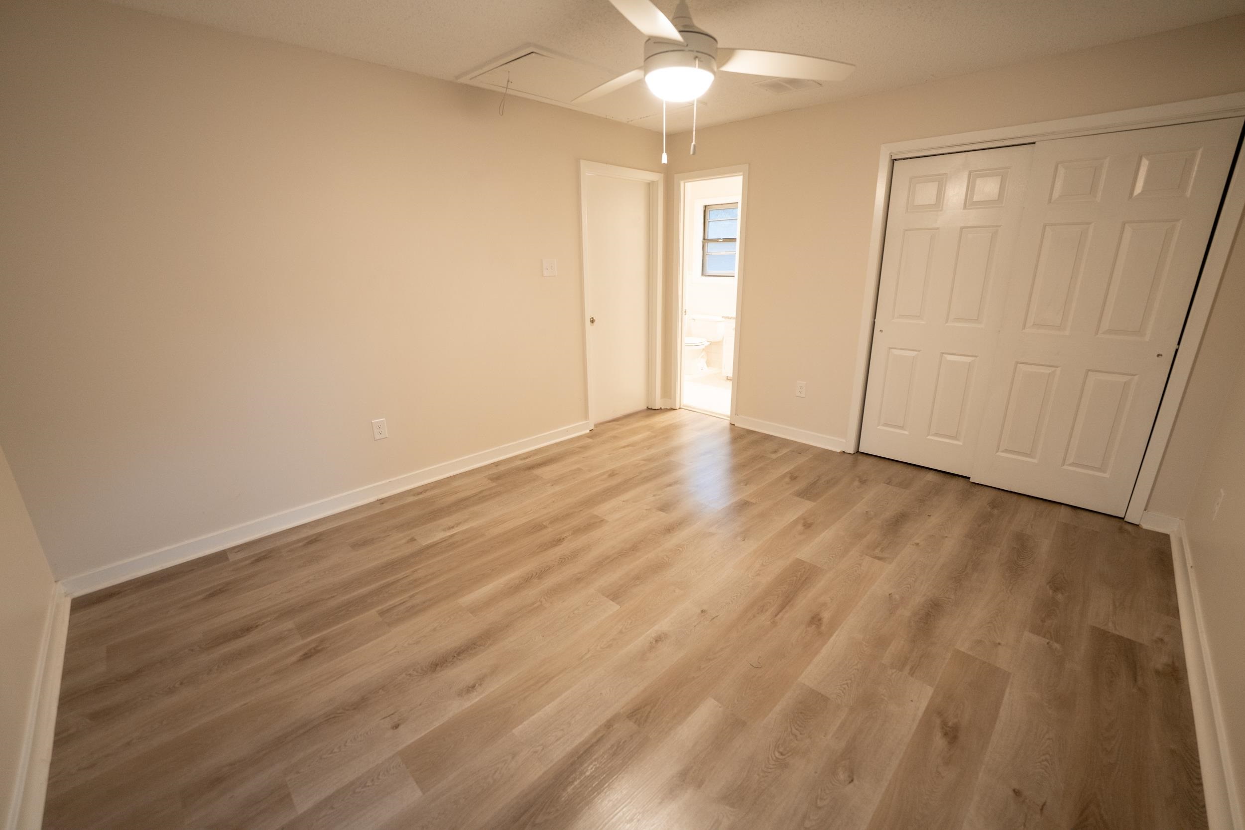 3054 Altruria Road Bartlett, TN 38134 - Photo 15 of 22 wooden floor in an empty room
