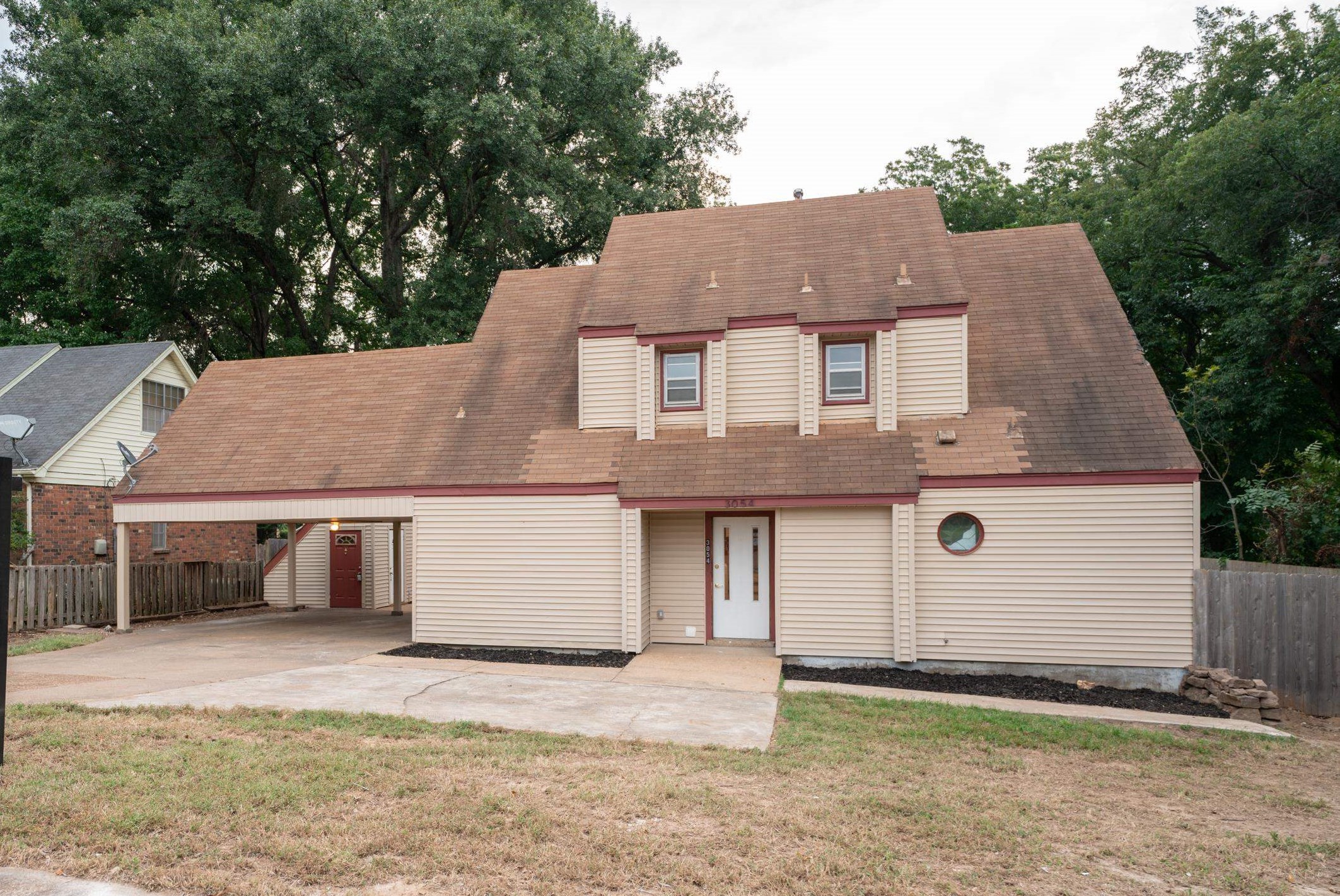 3054 Altruria Road Bartlett, TN 38134 - Photo 17 of 22 a front view of a house with a yard
