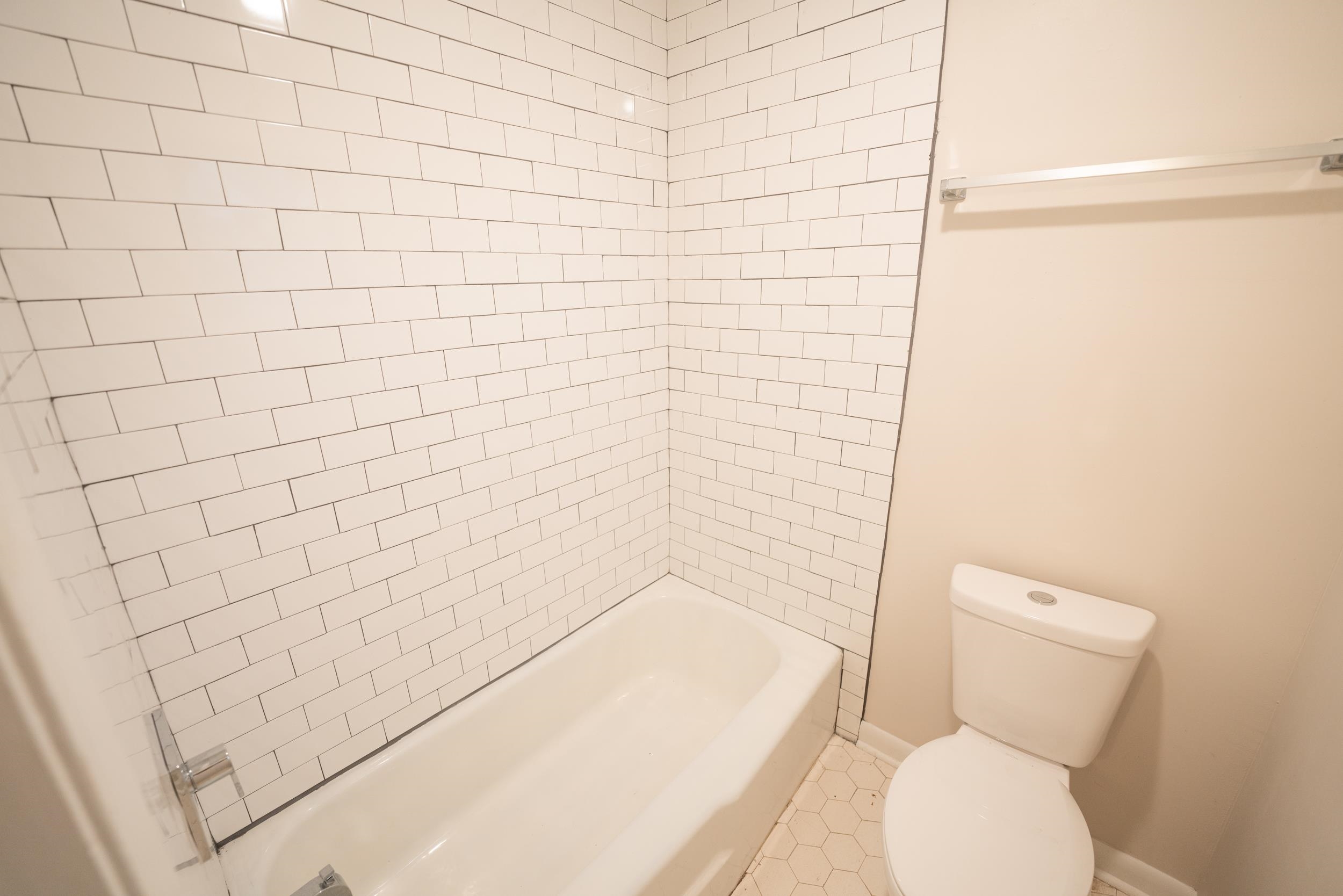 3054 Altruria Road Bartlett, TN 38134 - Photo 18 of 22 a bathroom with a toilet and a shower