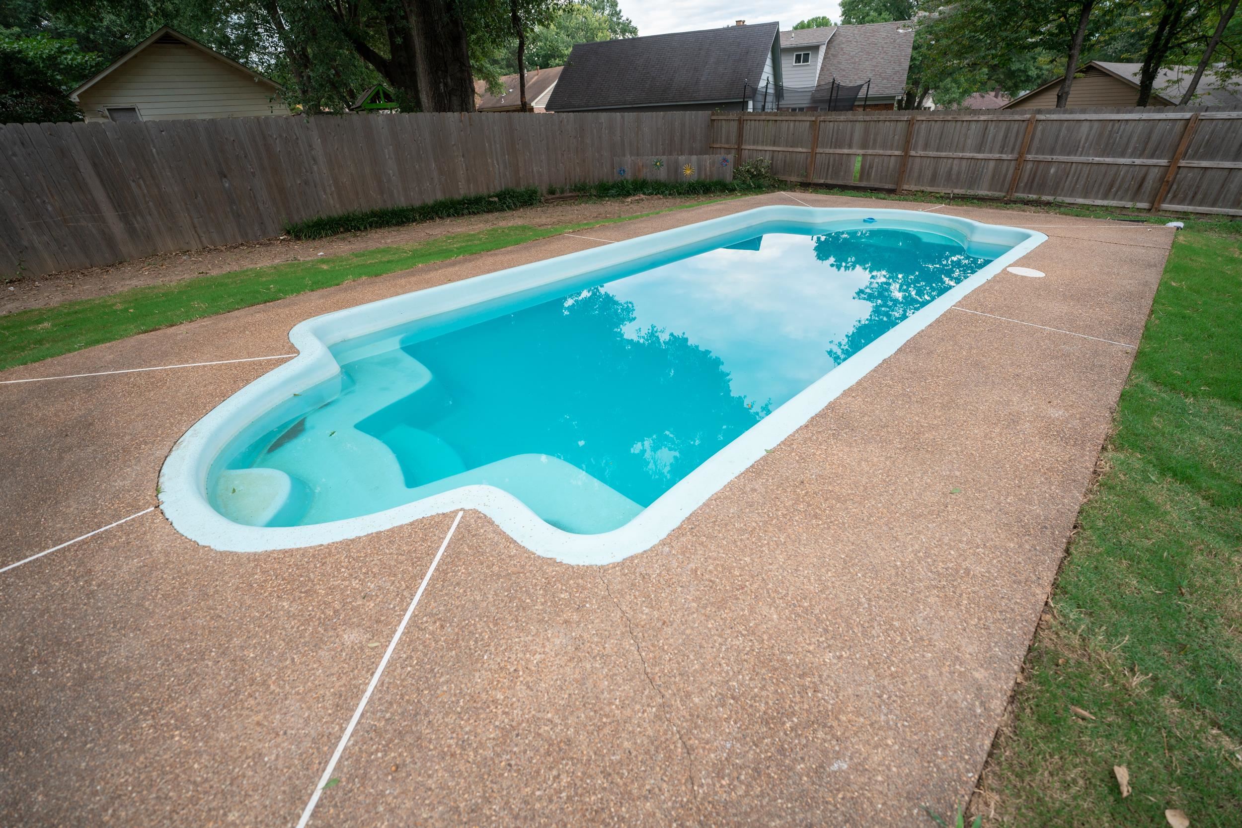 3054 Altruria Road Bartlett, TN 38134 - Photo 21 of 22 a view of a swimming pool with a backyard