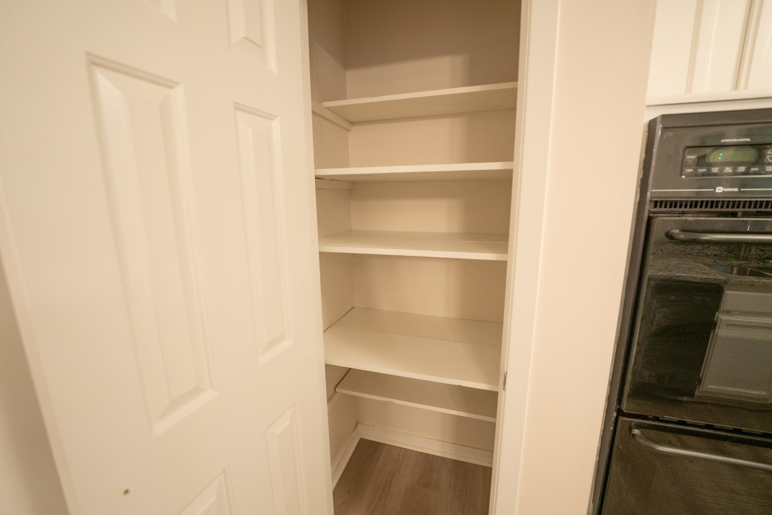 3054 Altruria Road Bartlett, TN 38134 - Photo 10 of 22 a view of walk in closet with empty racks