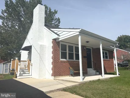 a front view of a house with a porch