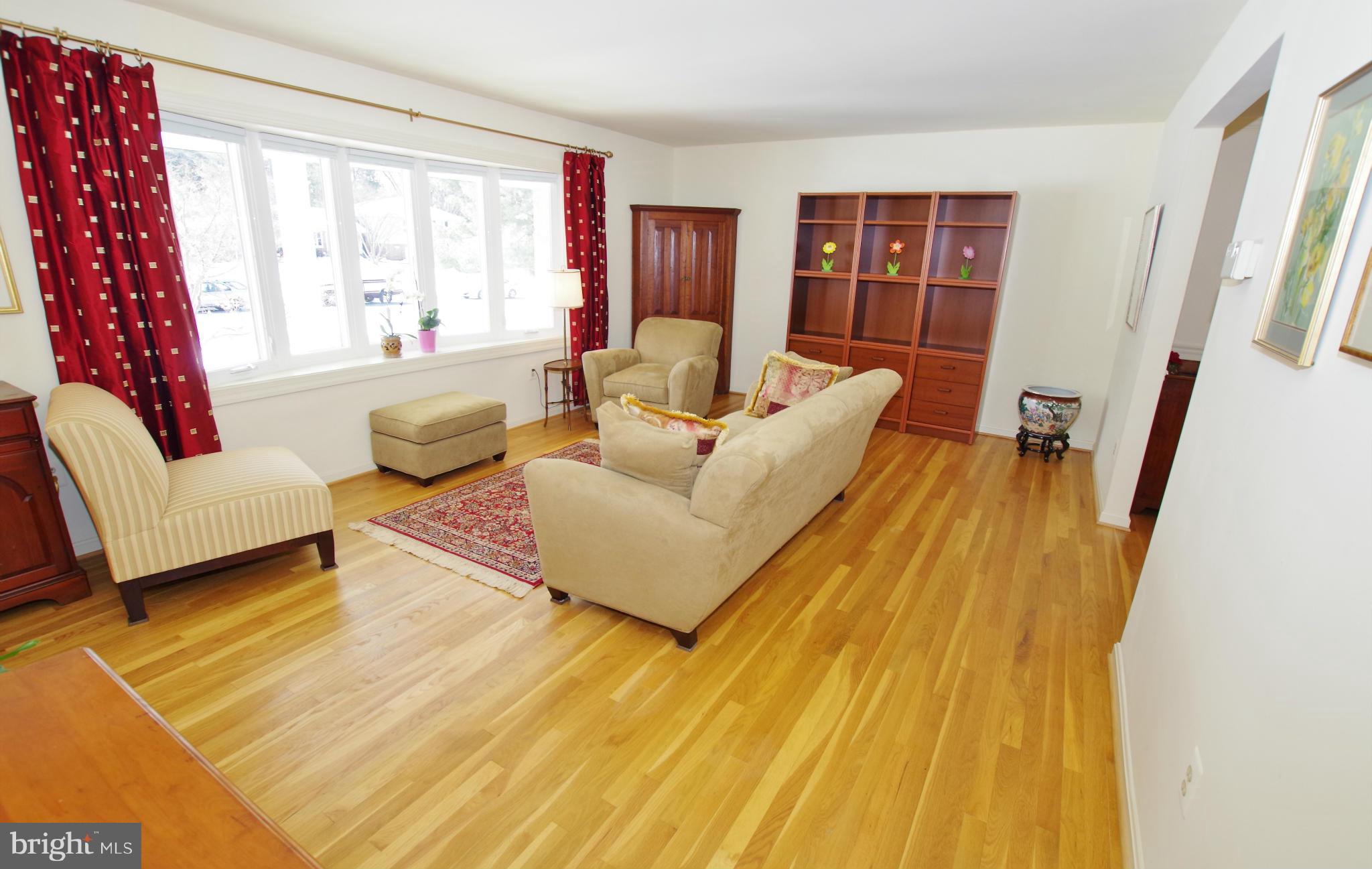 4121 Sir Walter Road Olney, MD 20832 - Photo 6 of 30 Elegant Living Room with Hardwood Floors