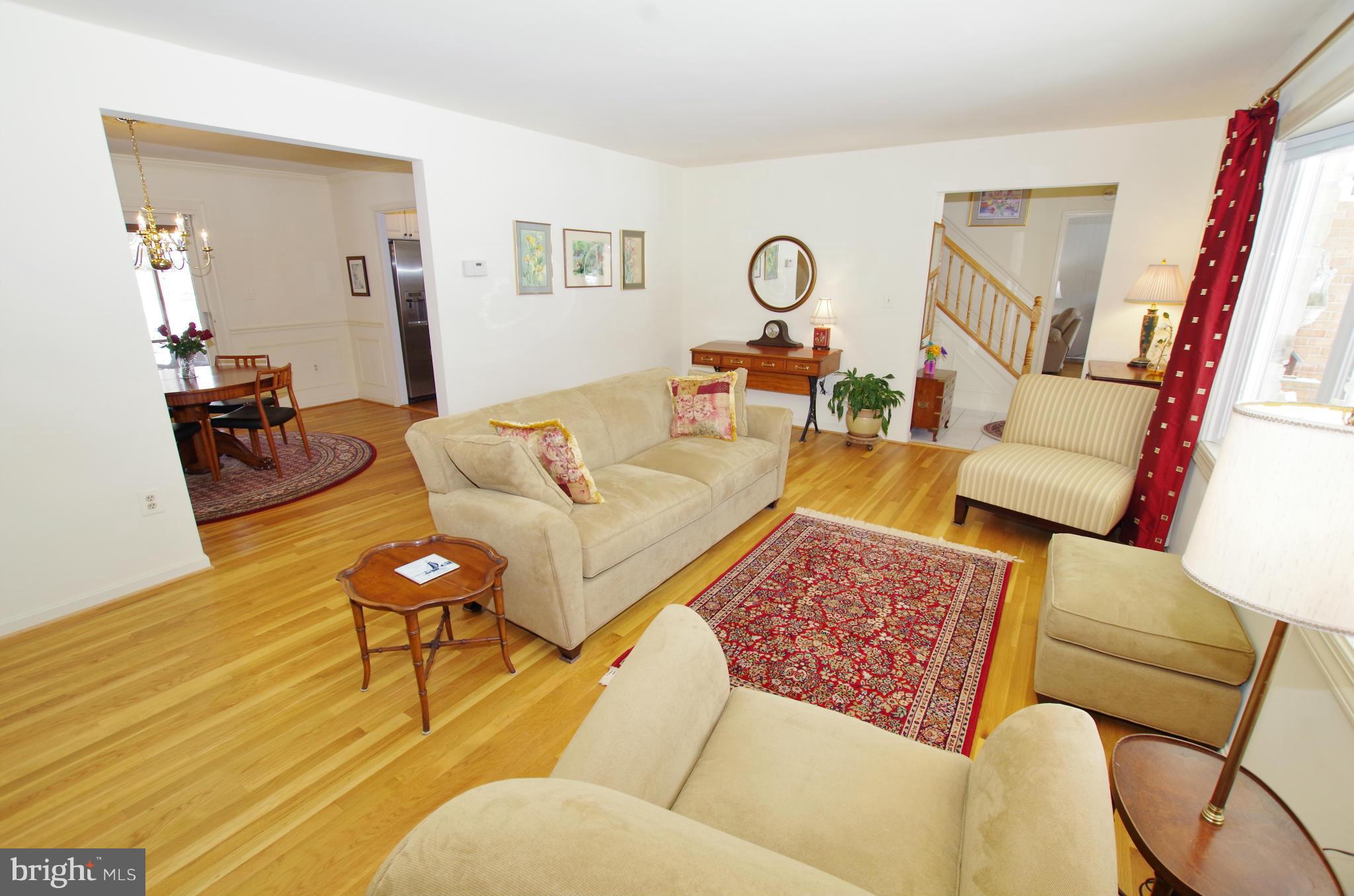 4121 Sir Walter Road Olney, MD 20832 - Photo 8 of 30 Living Room Opens to Dining Room