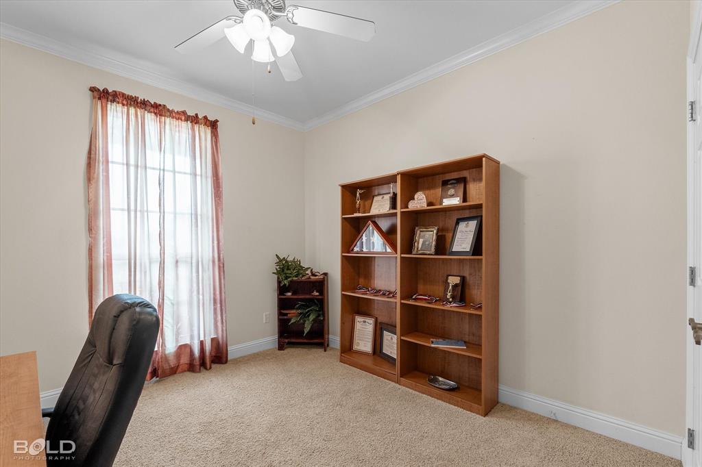 129 Wax Wing Drive Stonewall, LA 71078 - Photo 32 of 40 a livingroom with a workspace