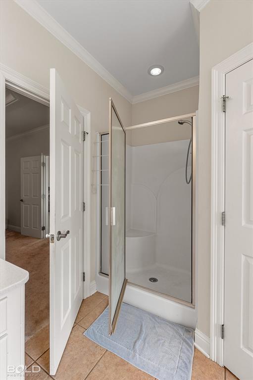 129 Wax Wing Drive Stonewall, LA 71078 - Photo 39 of 40 a bathroom with a glass shower door