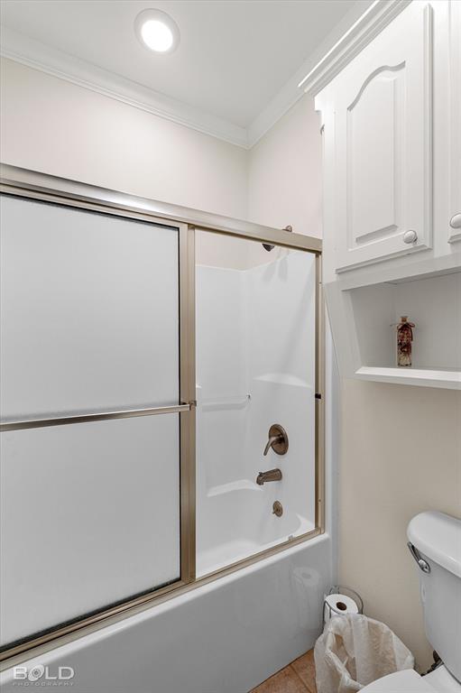 129 Wax Wing Drive Stonewall, LA 71078 - Photo 40 of 40 a bathroom with a shower and a toilet