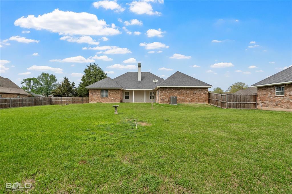 129 Wax Wing Drive Stonewall, LA 71078 - Photo 10 of 40 a front view of a house with garden