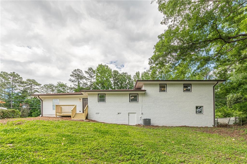 3275 Clifton Church Road Southeast Atlanta, GA 30316 - Photo 11 of 59 a view of a house with a yard