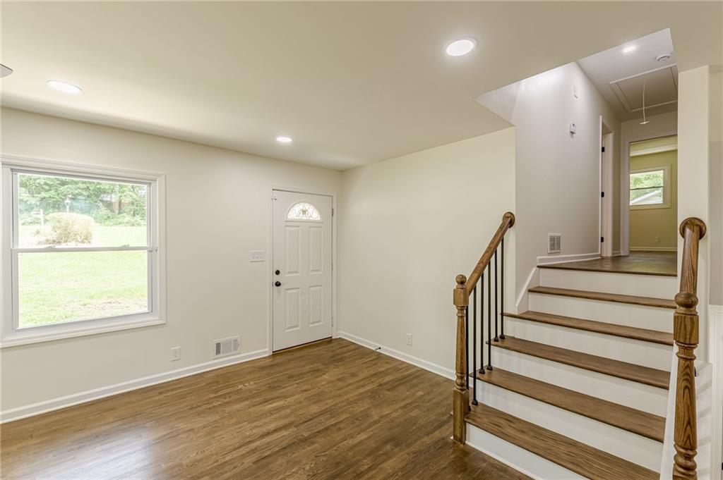 3275 Clifton Church Road Southeast Atlanta, GA 30316 - Photo 24 of 59 a view of a hallway with wooden floor and entryway