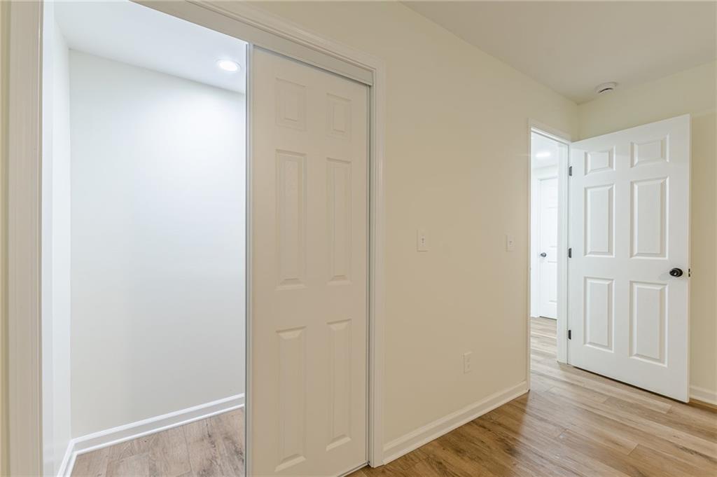 3275 Clifton Church Road Southeast Atlanta, GA 30316 - Photo 55 of 59 a view of a hallway with wooden floor