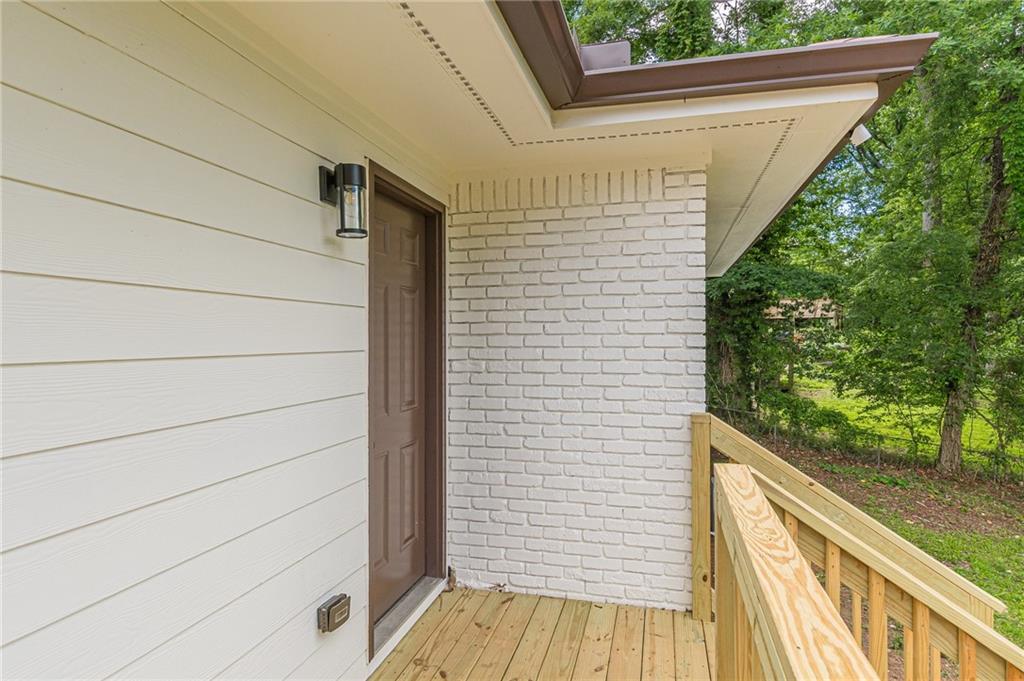 3275 Clifton Church Road Southeast Atlanta, GA 30316 - Photo 59 of 59 a view of a balcony with wooden floor and deck