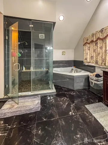 a bathroom with a sink and a bathtub