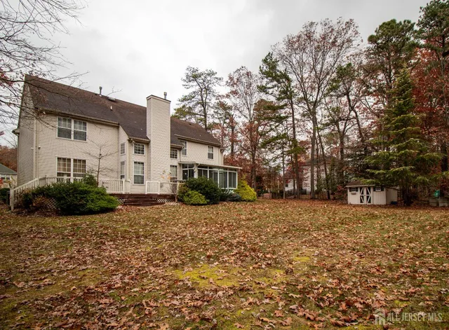 a view of a house with a street