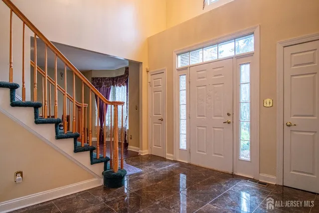 a view of an entryway with staircase