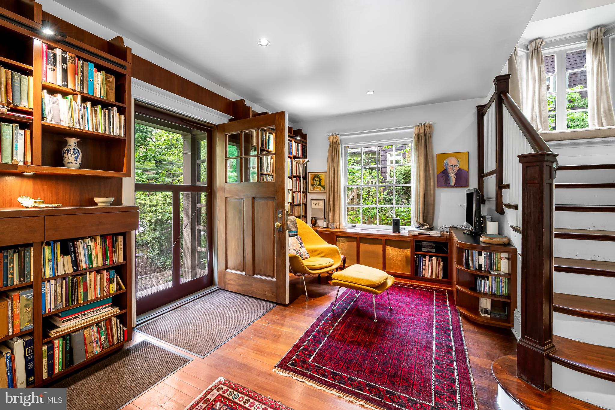 111 Deepdene Road Baltimore, MD 21210 - Photo 12 of 61 a living room with furniture and a book shelf