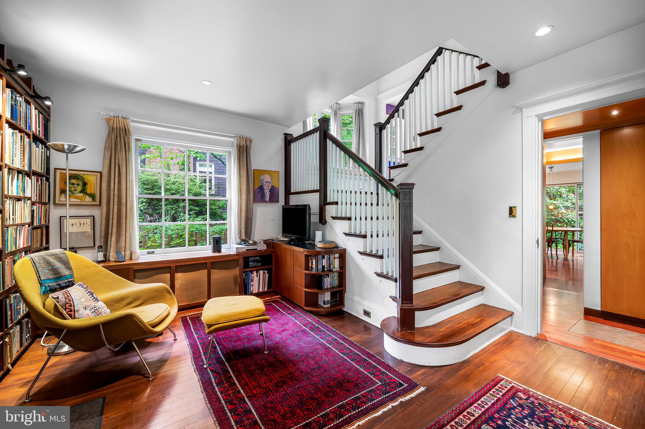 111 Deepdene Road Baltimore, MD 21210 - Photo 13 of 61 a living room with furniture and a floor to ceiling window