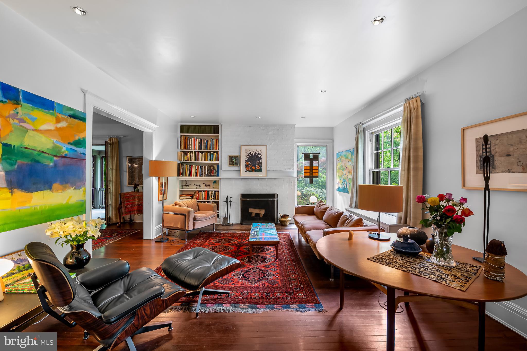 111 Deepdene Road Baltimore, MD 21210 - Photo 15 of 61 a living room with furniture fireplace and a flat screen tv