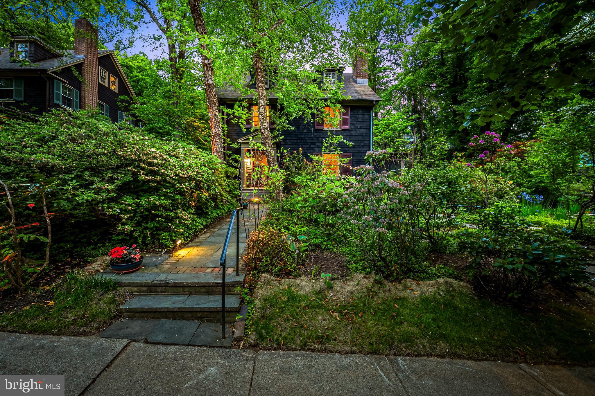 111 Deepdene Road Baltimore, MD 21210 - Photo 2 of 61 a view of a garden with plants and large trees