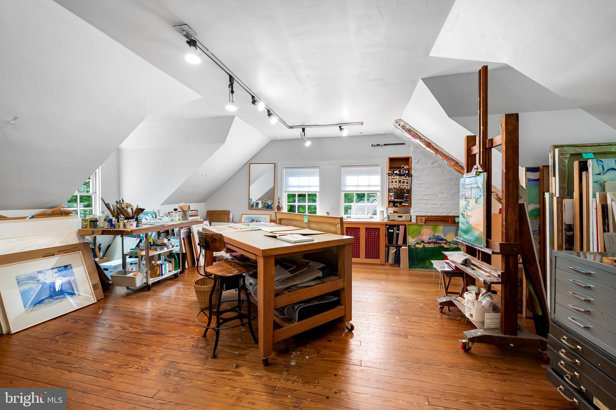111 Deepdene Road Baltimore, MD 21210 - Photo 45 of 61 a living room with stainless steel appliances lots of furniture and wooden floors