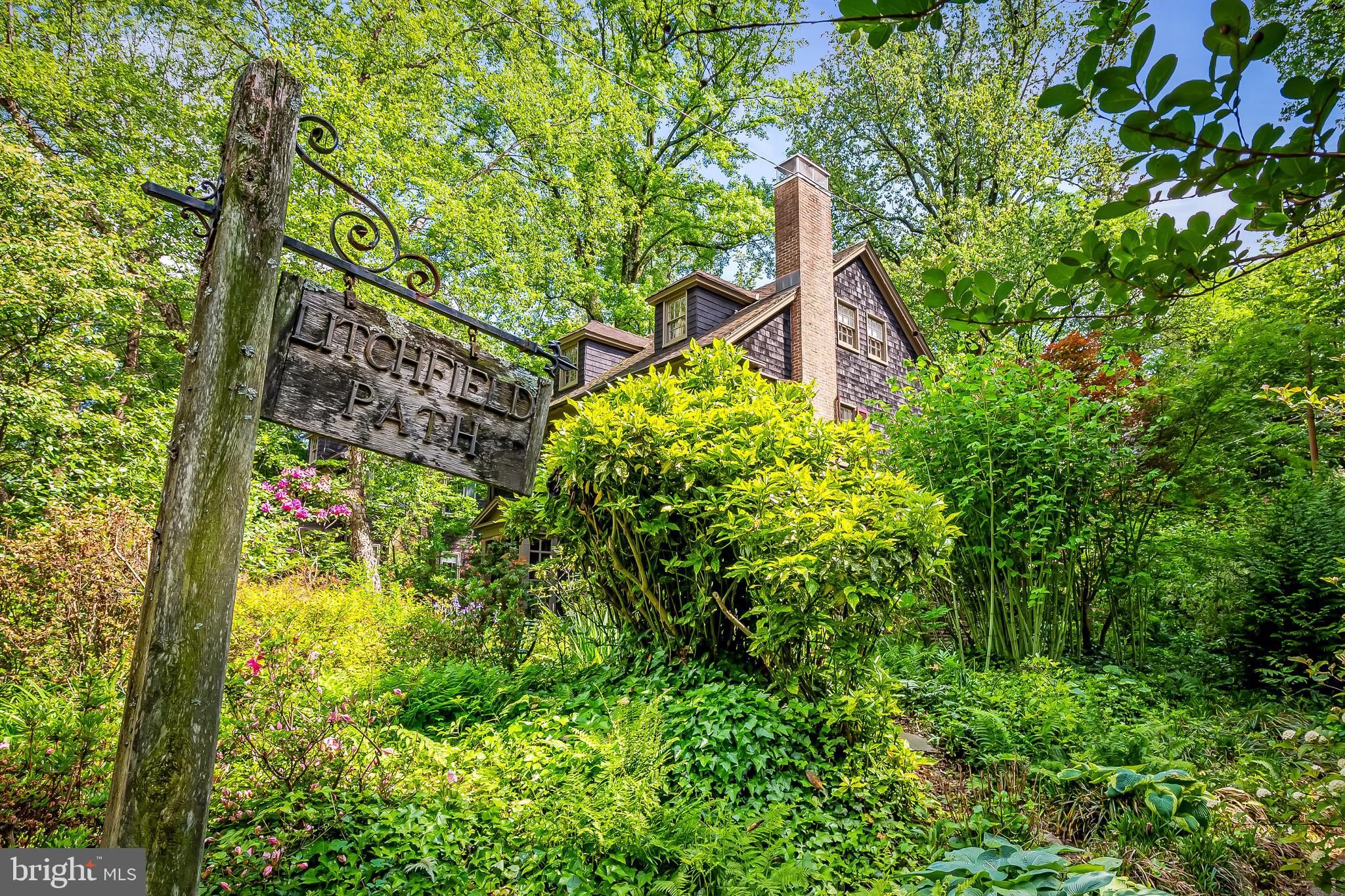 111 Deepdene Road Baltimore, MD 21210 - Photo 61 of 61 a backyard of a house with lots of green space and trees all around