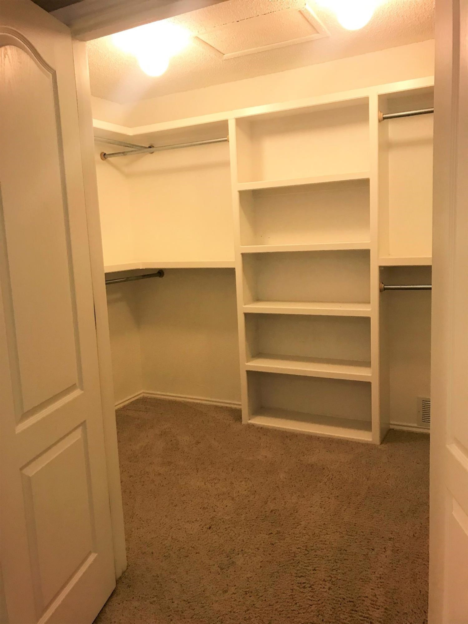305 Ranch Street Ropesville, TX 79358 - Photo 8 of 10 a view of an empty walk in closet
