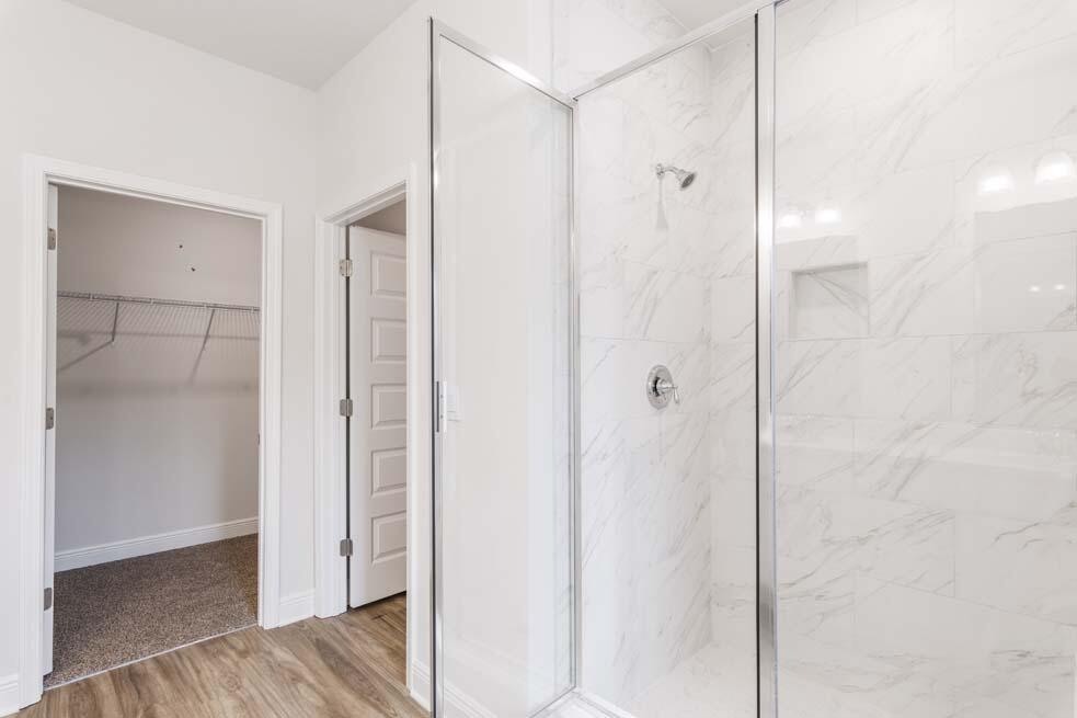 44 Oak Trees Lane West Freeport, FL 32439 - Photo 14 of 23 a bathroom with a shower and a glass door