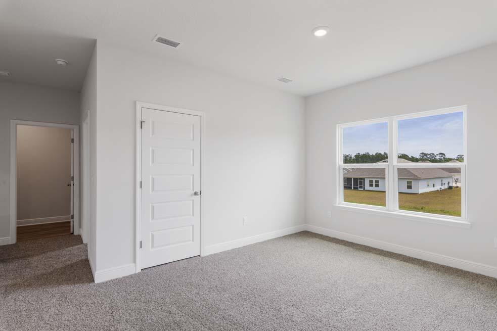 44 Oak Trees Lane West Freeport, FL 32439 - Photo 16 of 23 a view of an empty room with a window