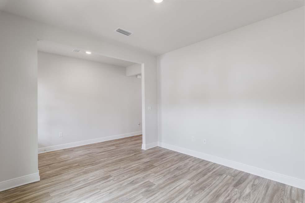 44 Oak Trees Lane West Freeport, FL 32439 - Photo 2 of 23 a view of an empty room with wooden floor