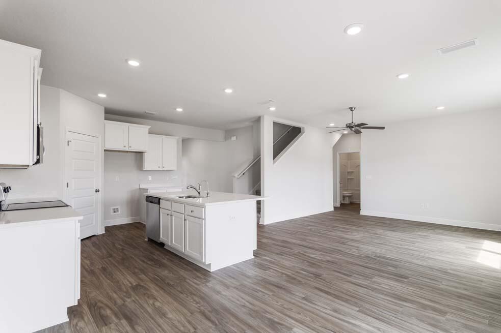44 Oak Trees Lane West Freeport, FL 32439 - Photo 5 of 23 a kitchen with a sink and a stove top oven