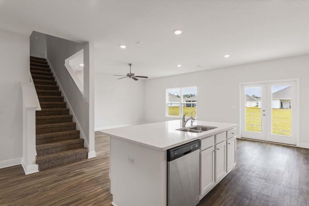 44 Oak Trees Lane West Freeport, FL 32439 - Photo 7 of 23 a kitchen with a sink and a stove