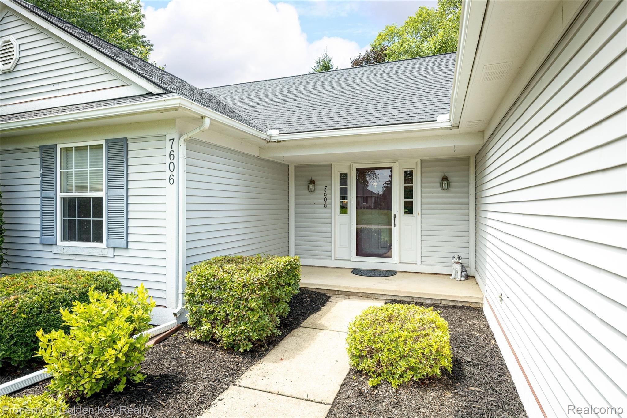 7606 Wellington Road Brighton, MI 48116 - Photo 2 of 25 Front Door Walk Way
