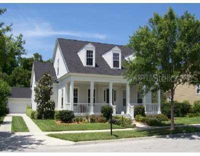 917 Spring Park Loop Celebration, FL 34747 - Photo 1 of 1 a front view of a house with a yard