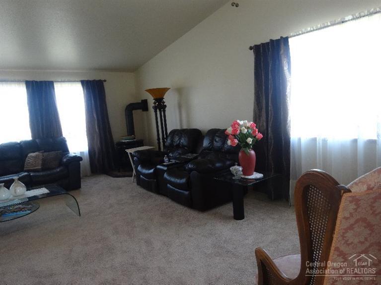 3864 Rimrock Acres Loop Prineville, OR 97754 - Photo 6 of 25 Living room from the dining/kitchen