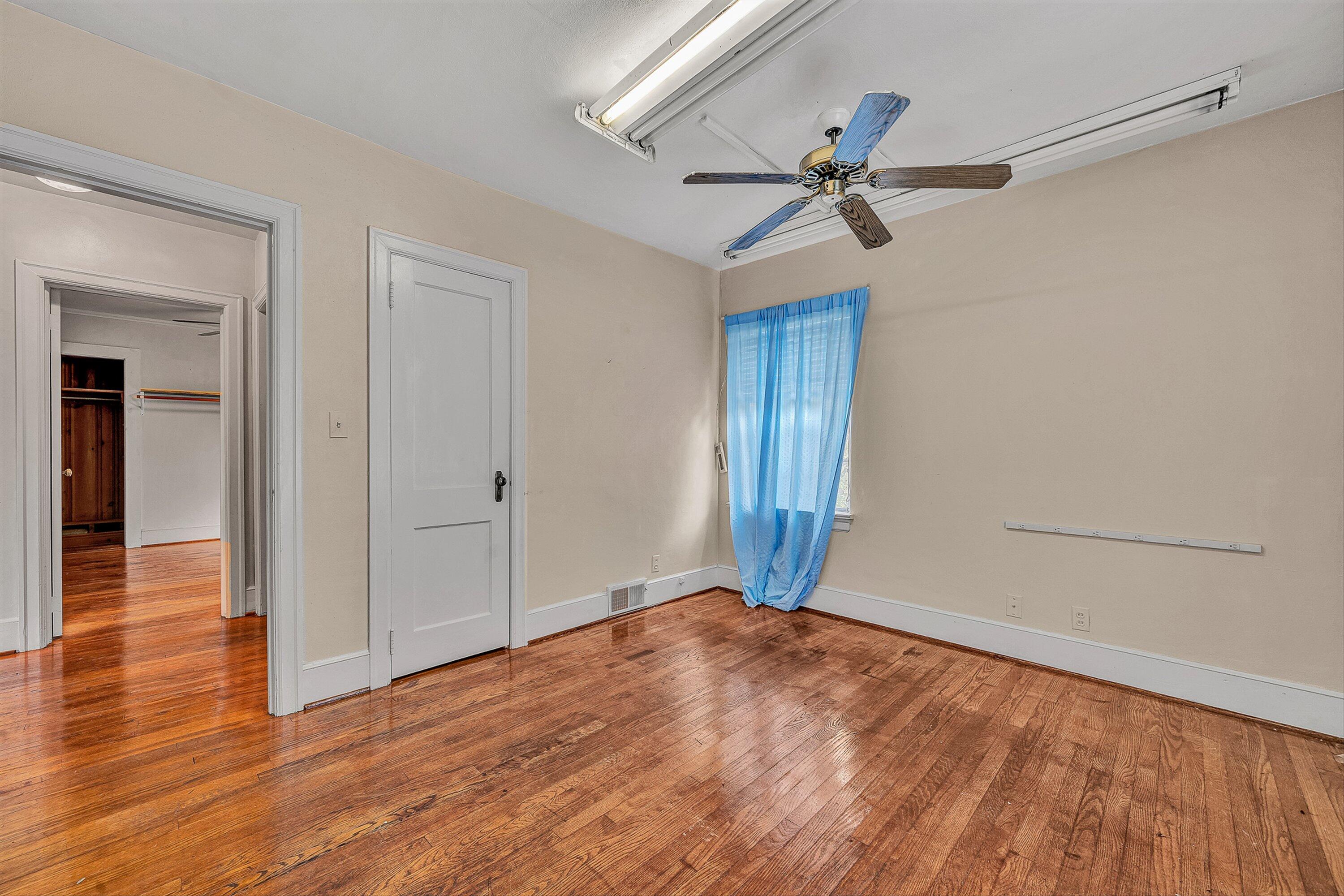 1917 Langdon Road Southwest Roanoke, VA 24015 - Photo 18 of 42 a view of an empty room and wooden floor