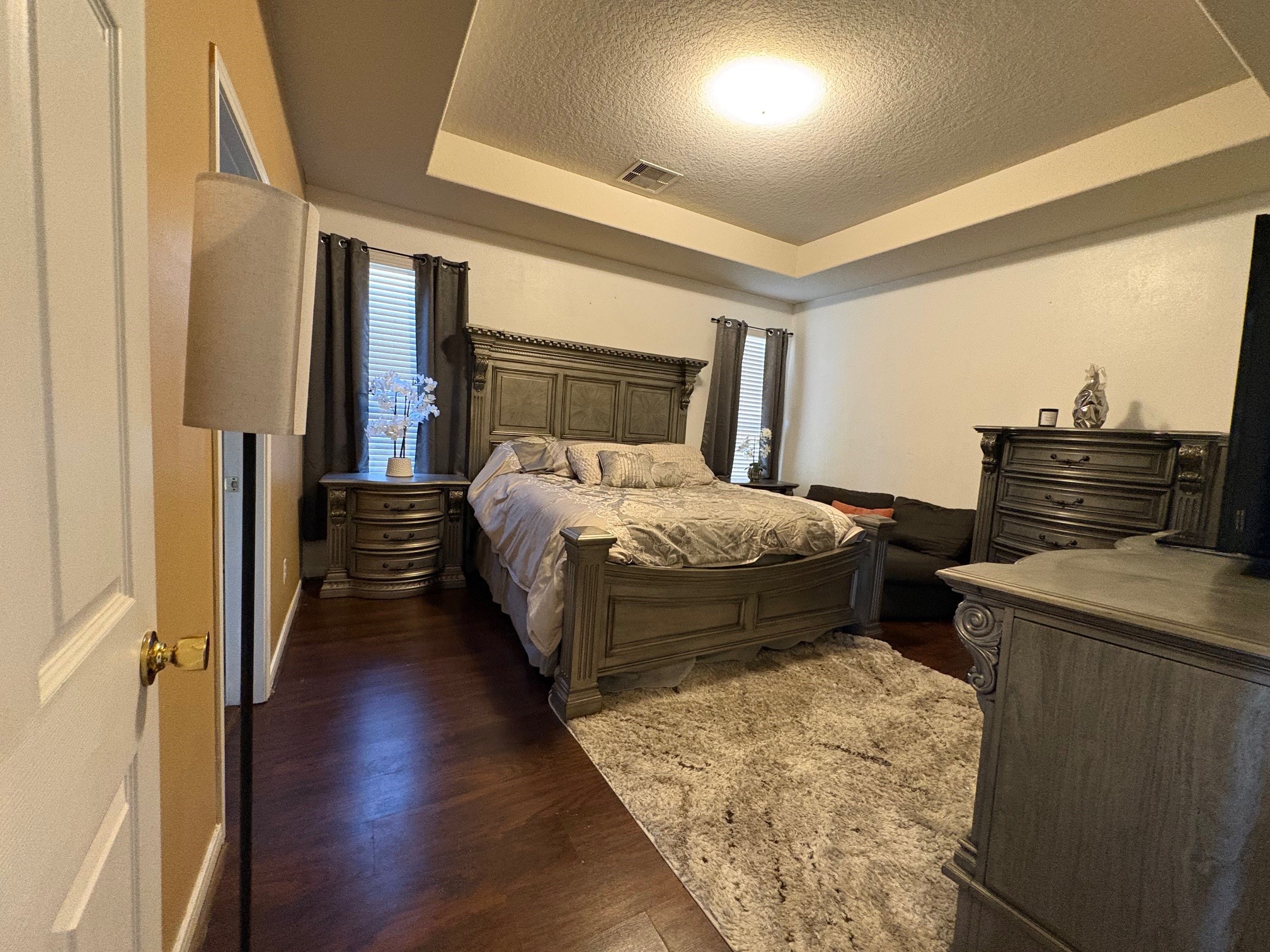 5915 Annatto Drive Baytown, TX 77521 - Photo 17 of 31 a bedroom with bed and wooden floor