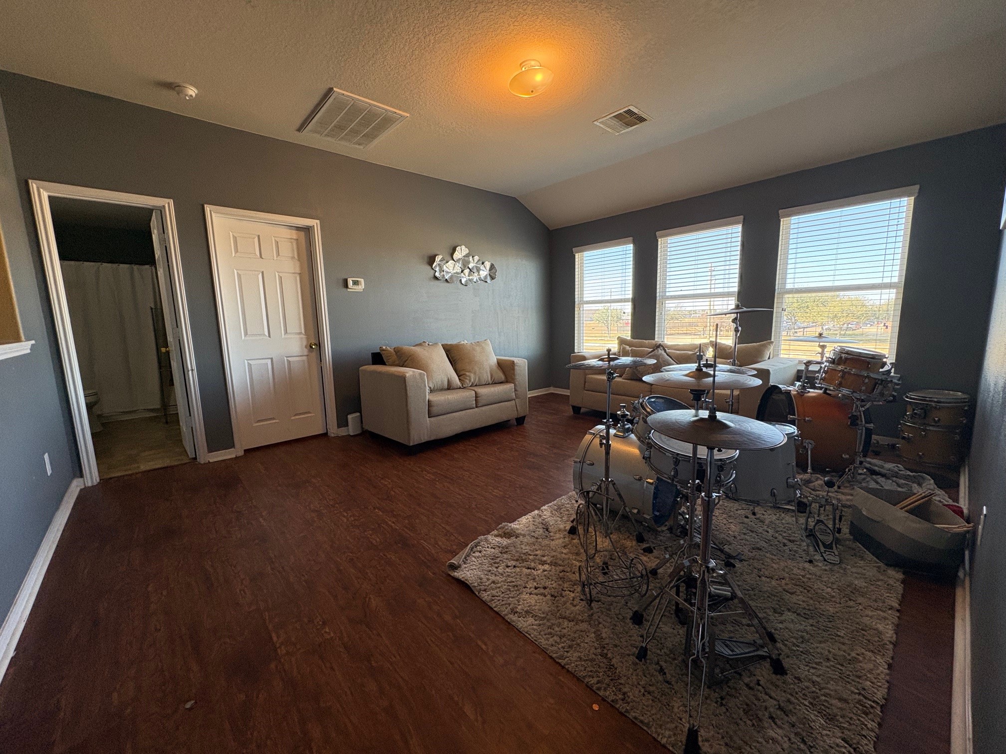 5915 Annatto Drive Baytown, TX 77521 - Photo 21 of 31 a living room with furniture and large windows