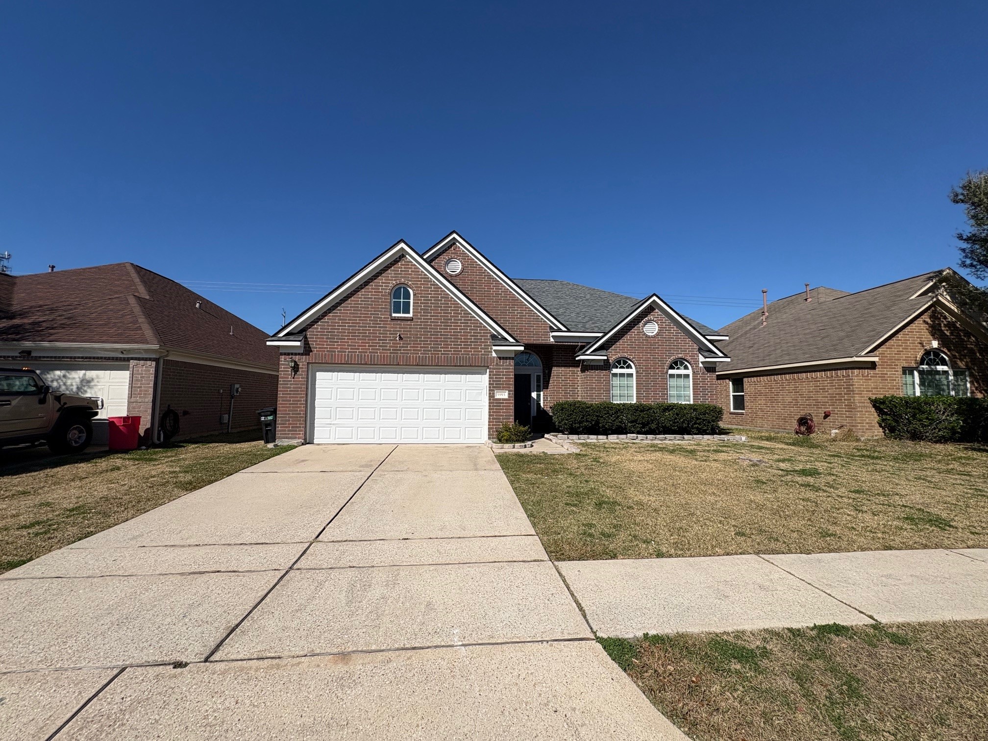 5915 Annatto Drive Baytown, TX 77521 - Photo 3 of 31 a front view of a house with a yard