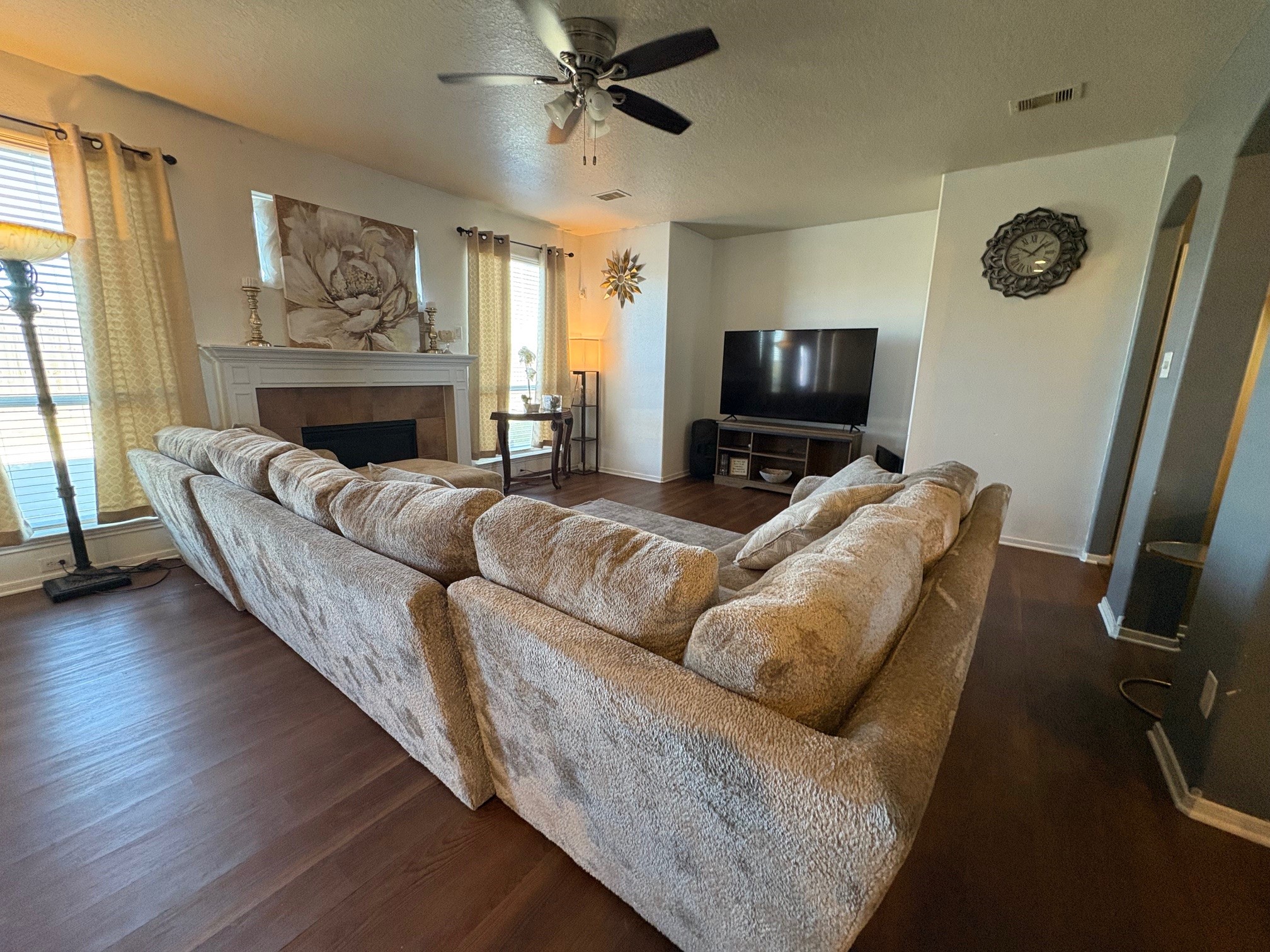 5915 Annatto Drive Baytown, TX 77521 - Photo 9 of 31 a living room with furniture and a flat screen tv