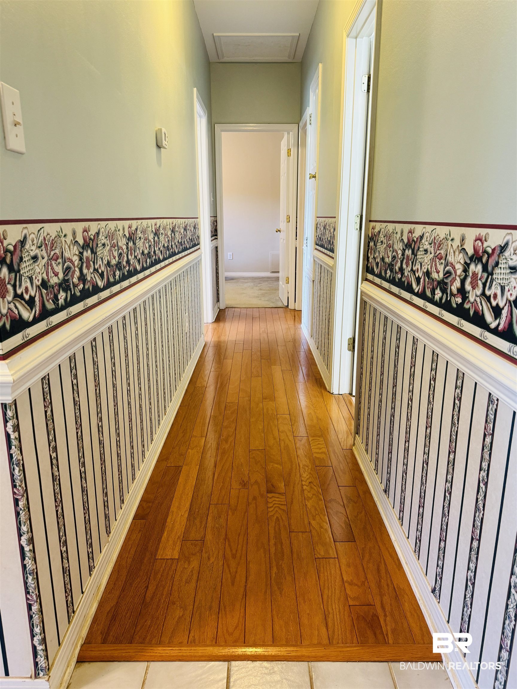 13795 White Road Silverhill, AL 36576 - Photo 53 of 99 Hall featuring light wood finished floors, wainscoting, and wallpapered walls