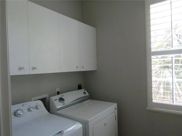 a view of a table and chairs in patio
